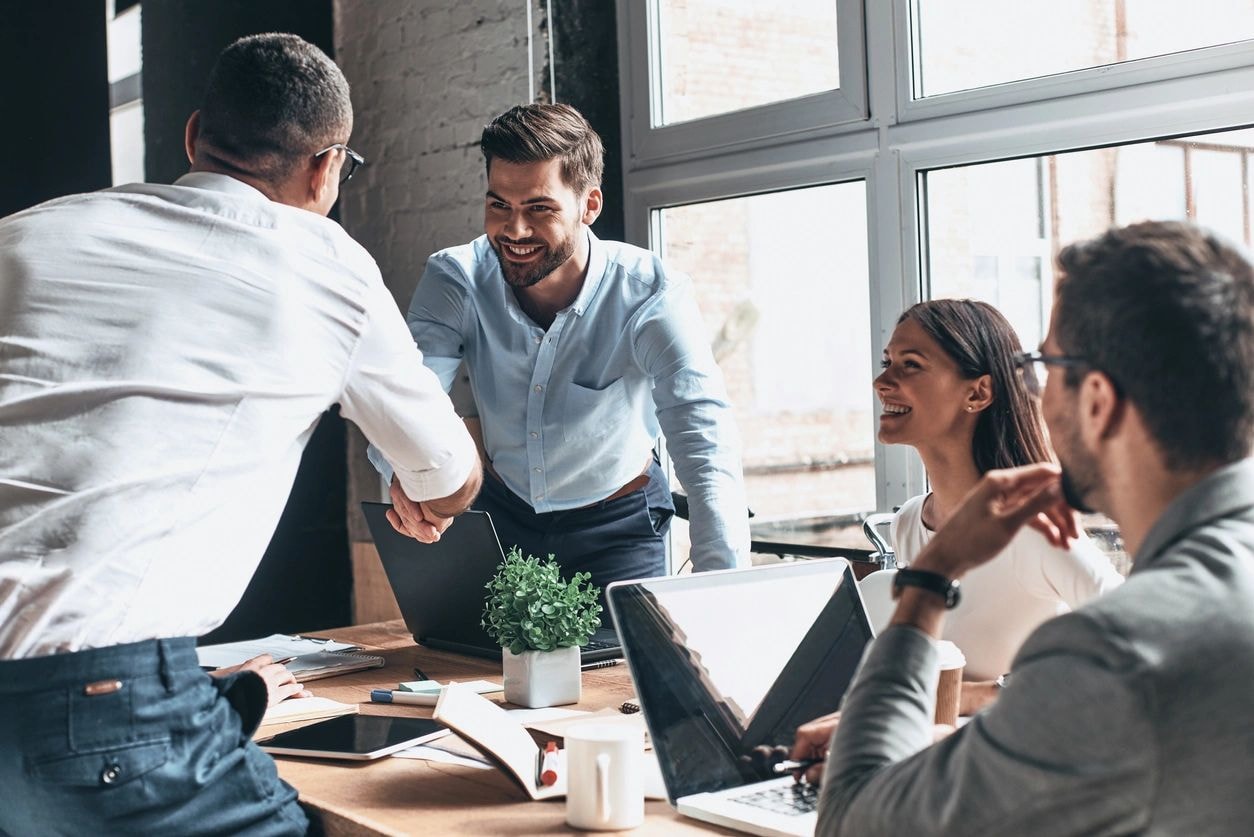 Professionals collaborating in a meeting